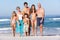 Three Generation Family On Holiday At The Beach