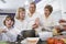 Three generation family in kitchen eating lunch