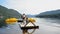 Three generation family pulling a wooden raft on the lake in mountains