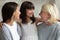 Three generation relatives women spend time together at home