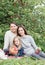 Three generations of women of  same family in  apple orchard at  picnic