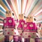 Three girl robot toys looking forward,
