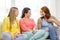 Three girlfriends having a talk at home