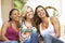 Three Girlfriends Sitting On Steps Of Building