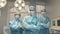 Three girls nurse in the operating room take off the face mask and smile