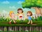 Three girls playing jump rope in the park