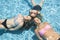 Three girls relaxing in the pool