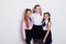 Three girls schoolgirl in glasses lesson at school