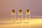 Three glass corked bottles filled with liquid. Background for science and medicine. Virus vaccine