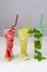 Three glasses with various soft drinks to quench your thirst on a hot summer day, watermelon, mint and lemon drinks with