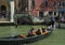 Three gondola passengers in Venice