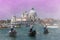 Three gondolas on canal grande and Santa Maria della Salute church