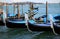 Three gondolas near St. Mark\'s square in Venice