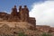 The Three Gossips rock formation at sunset Arches National Park Moab Utah.