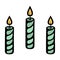 Three green candles. Burning yellow flame of a twisted candle. Decoration for a birthday cake