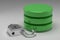 Three green disks in stack and unlocked steel padlock. Access granted to Data or Database in result of hacker attack. Concept of d