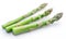 Three green fresh asparagus sprouts white background