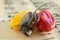 Three habanero very hot chili peppers, ripened capsicum chinenses on wooden table