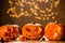 Three Halloween pumpkin lanterns