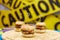 Three hamburgers with cucumber, cutlet and ketchup, on a wooden round board on a yellow background