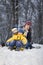 Three happy boys on sled