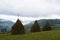 Three haystacks in the Ukrainian Carpathians