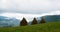 Three haystacks in the Ukrainian Carpathians