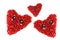 Three hearts from pomegranate seeds with muzzles on a white background