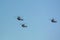 Three helicopters AW139 in the air