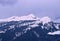 Three Himalayan Peaks of Shivalik Range - Blue Mountains Covered by White Snow with Cloudy Sky in Background - India, Asia