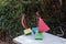 Three homemade toy ships on a white park bench. Children's sailb