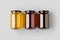 Three honey jars mockup on a grey background