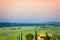 Three houses in Tuscany landscape, Italy