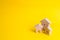 Three houses on a yellow background. Buying and selling of real