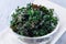 Three ingredient baked green kale chips with sea salt and olive oil, horizontal