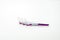 Three interdental brush with cover on white background with copy space