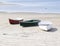 Three isolated dinghies or skiffs on Maine Coast