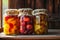 Three jars filled with a variety of fruits, showcasing colorful and tasty preserved produce