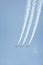 Three jet airplanes performing aerobatic stunt