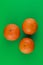 Three juicy, sweet tangerines, friendly, placed next to each other