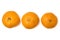 Three juicy tangerines lined up in a row. Isolated on a white background. Holiday mood. Top view