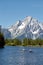 Three Kayakers in front of the Grand Teton.