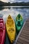 Three Kayaks at Sunset moored to a pontoon on the edge of Lac d`Esparron Provence France