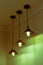 Three lamps with vintage incandescent bulbs with warm light