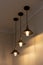 Three lamps with vintage incandescent bulbs with warm light