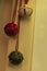 Three large metal sleigh bells hung together with jute for christmas