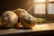 Three large potatoes on an old rustic kitchen table top