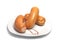 Three large small sausages on aplate