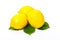 Three lemons and lemon leaves