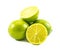 Three lemons and limes and one cut in half on a white background